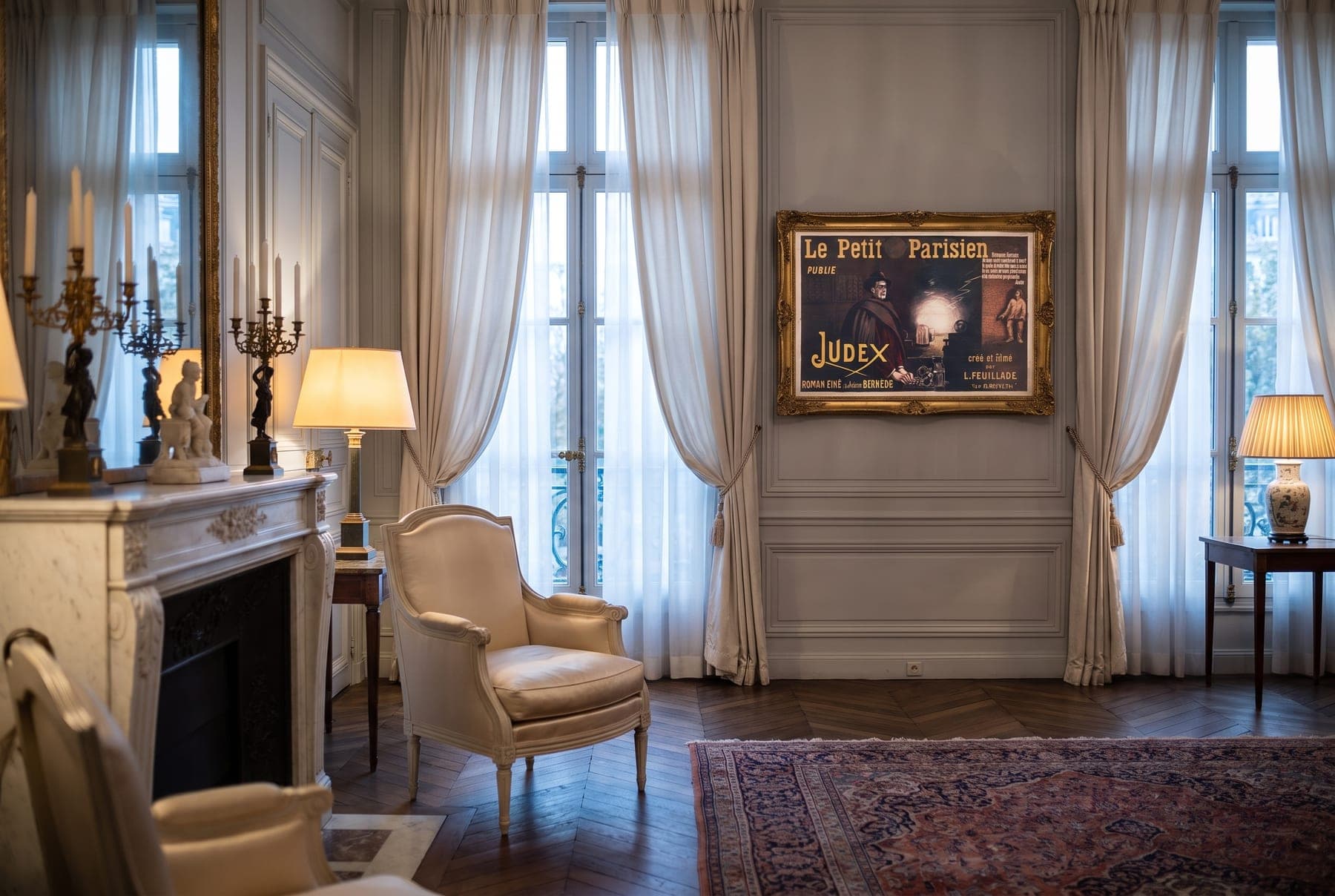 Cappiello’s Judex affiche reproduction, framed in a refined Parisian salon